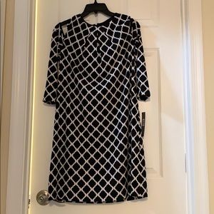 Never been worn Tahari dress. With tags